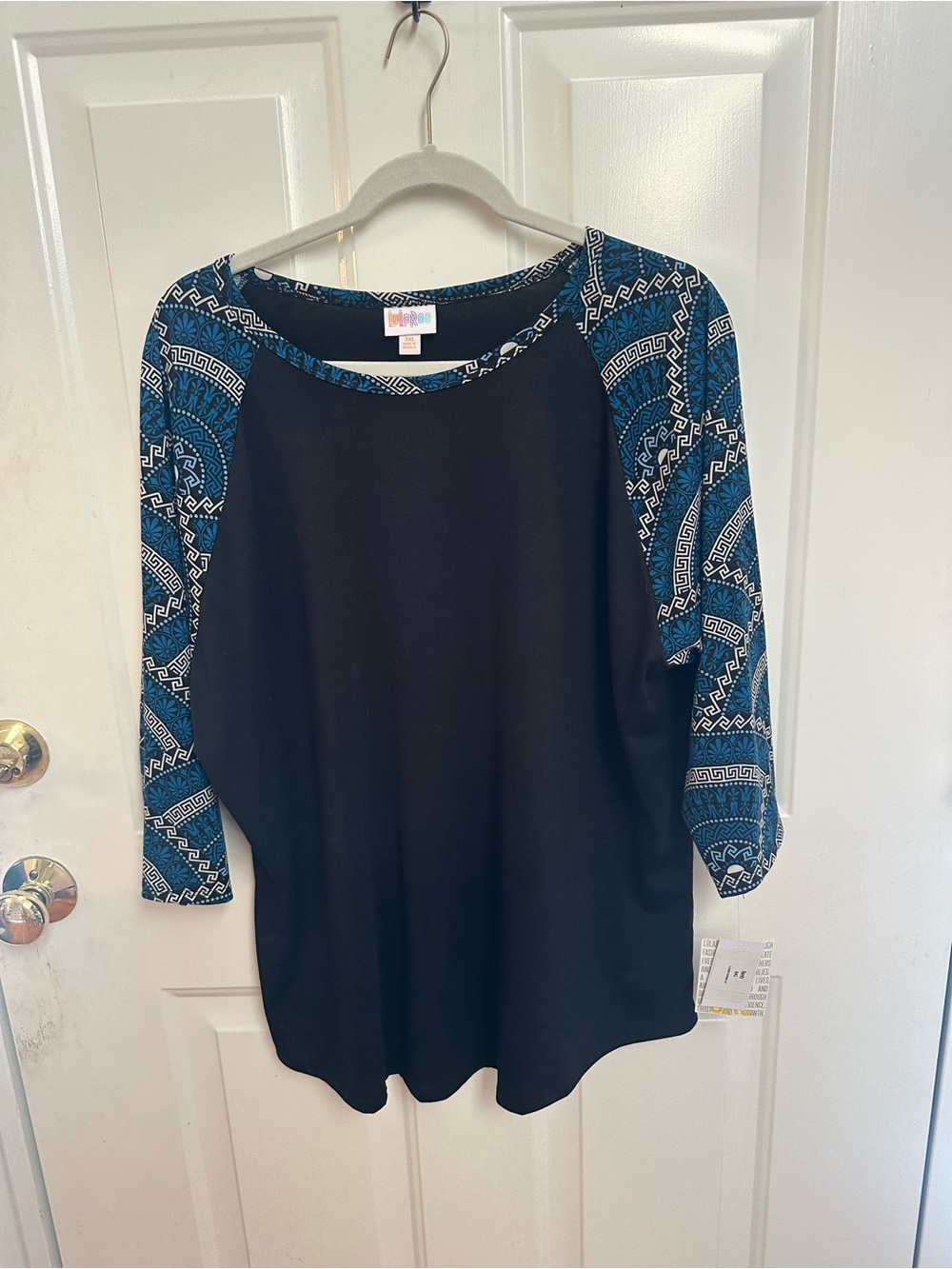 LuLaRoe Black Top with Blue Patterned Raglan Sleeves